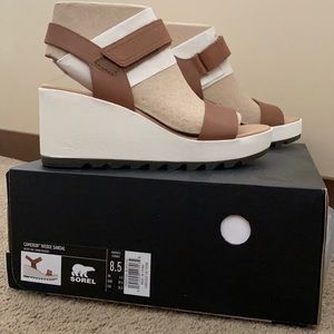 Brand new in box. Sorel wedge sandals.